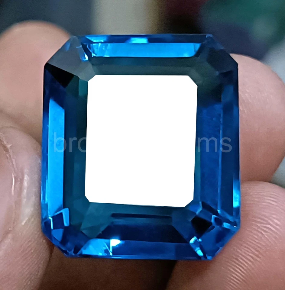 Piedra preciosa natural UV de fluorita azul verdoso corte esmeralda 66,95 quilates cambio de color 5ARA Foto 1 de 4