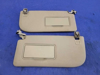 Par de parasoles delanteros gris Homelink 2789 para camioneta Ford F150 2015-2017 Foto 1 de 4
