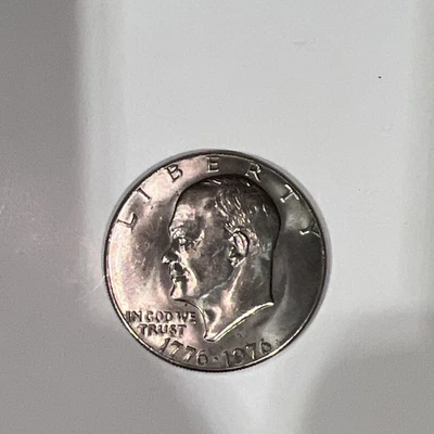 1776-1976  D Eisenhower Liberty Bell Moon Silver One Dollar US  - Image 1 of 3