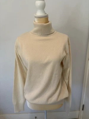 Suéter de cuello alto de cachemir crema marfil The Row para mujer, talla XS Foto 1 de 4