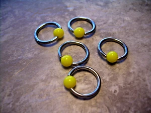 One  7/16" 11mm 14g Yellow 5mm Ball Captive Bead Ring Nipple Ear Nose Lip BB3 - Picture 1 of 2