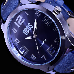 QBos Damen Armband Uhr Blau Silber Farben Nieten L54