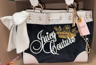 Bolso de Mano Juicy Couture The Key To Juicy Licorice Negro Daydreamer Beige Lazo Foto 1 de 4