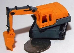 Kleine Micro Maschine orange und grau Bagger # 4 - Bild 1 von 5