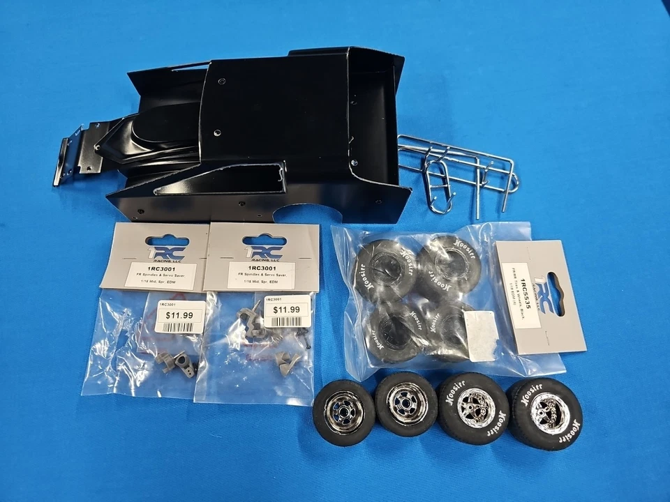 1rcEDM body,bumpers, Side Bars,Front Spindles, Servo Savers. 2 Sets New Tires. - Image 1 of 1