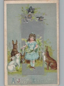 A Joyful Eastertide Little Girl Feeding Bunnies Postcard 1910 - Picture 1 of 2
