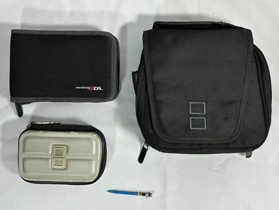 Lote de fundas de viaje Nintendo DS + lápiz óptico sable de luz azul duro y suave con almacenamiento de juegos Foto 1 de 4