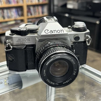Vintage Canon AE-1 Program 35mm Film Camera Canon FD W/ 2 Lenses - Image 1 of 4
