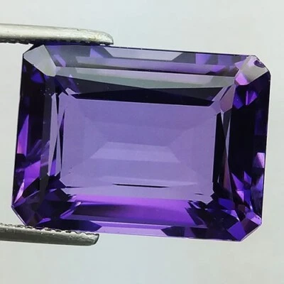 27.35 Ct. Loose Gemstone Purple Amethyst Emerald Cut 22x16x10 Mm. - Image 1 of 3