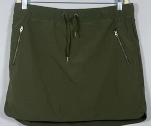 Falda corta Athleta Trekkie verde oliva cremallera bolsillos mujer L golf tenis caminar - Imagen 1 de 4