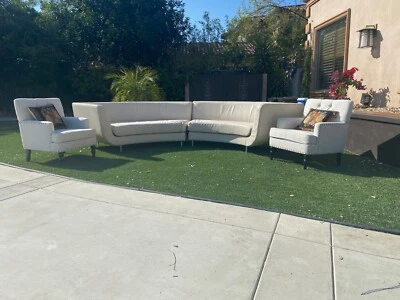 Sofá curvo seccional de cuero moderno/contemporáneo con juego de sillas Foto 1 de 4