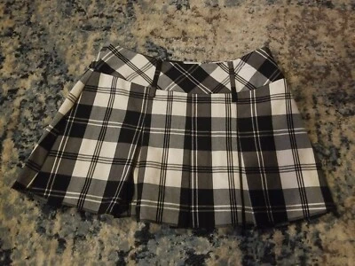 Falda corta con cremallera a cuadros blanca y negra Candies para niñas talla 1  Foto 1 de 4