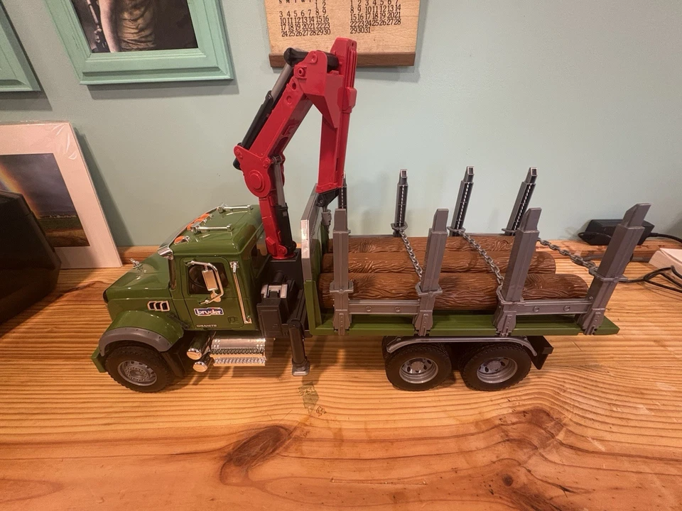Vintage 2007 Bruder Mack Granite Timber Truck w/ Loading Crane and 3 Trunks - Image 1 of 4
