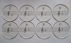 Un set di 8 sottobicchieri circolari acrilici musica ottava - Foto 1 di 2