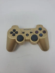 Controlador inalámbrico Sony PlayStation PS3 DualShock 3 Sixaxis dorado OEM probado - Imagen 1 de 7
