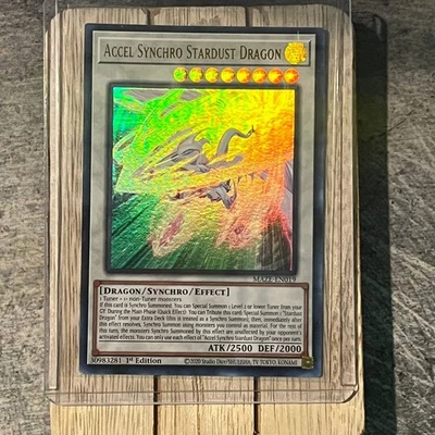 Near Mint - Ultra Rare - 1st Edition Accel Synchro Stardust Dragon MAZE-EN019 - Image 1 of 4