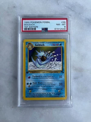 GOLDDUCK 35/62 PSA 8 NM-MT 1ST EDITION FOSSIL WOTC Vintage - Image 1 of 2