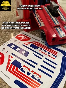 EVEL KNIEVEL 1976 LUSTIGES AUTO/FORMEL 1 ERSATZ PEEL-N-STICK GESTANZTES AUFKLEBERSET - Bild 1 von 14