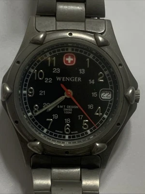 Винтажные швейцарские часы Wenger Smt Design 38 мм 095,0695 пушечный металл новый аккумулятор работает - Изображение 1 из 4