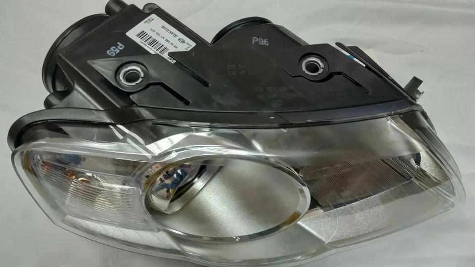 247014061 Conjunto de faros delanteros derechos HELLA para VW Passat 2006 a 2010 Foto 1 de 4