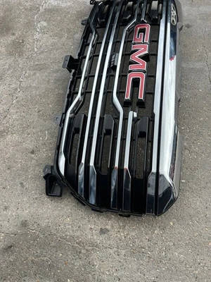 GMC SIERRA 1500 AT4X 2022-2024 rejilla OEM parrilla central delantera con cámara 84878064 Foto 1 de 4