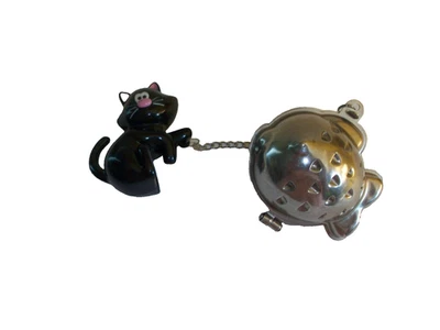 Gato de plástico negro con infusor de té en forma de pescado inoxidable Foto 1 de 4