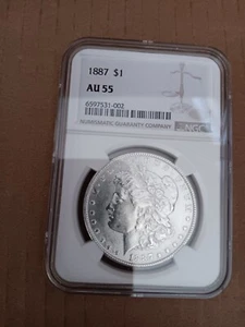 1887 Morgan Silver Dollar NGC AU 55 - Picture 1 of 2