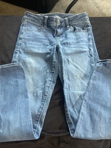 Women’s Size 4 Blue Denim Jeans Next Level Stretch By American Eagle - Picture 1 of 14