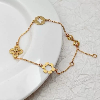 Pulsera Kira diseño flor Tory Burch💛 Foto 1 de 4