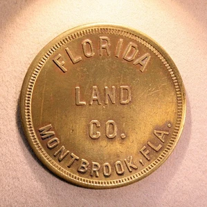 RARE - R10 Florida lumber token - Florida Land Co., 50¢, Montbrook, Fla. - Picture 1 of 2