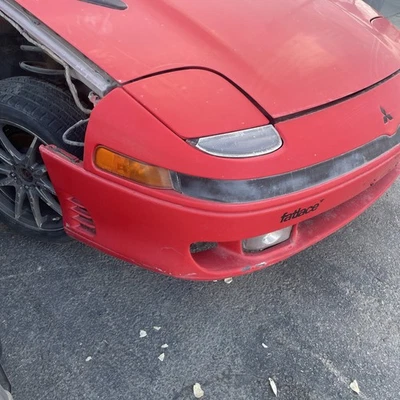 91-93 MITSUBISHI 3000GT CUBIERTA DE PARACHOQUES DELANTERO ROJO OEM Y BARRA DE REFUERZO DE PARACHOQUES Foto 1 de 4