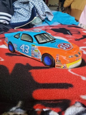 Pontiac Grand Prix 1996 NASCAR John Andretti #43 STP • azul/naranja Foto 1 de 4