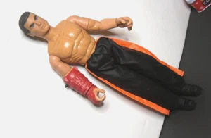 Figura Retro Action-Man - Guantelete Rojo y Pantalones Negros y Naranja Juguete - 11" a_4 - Imagen 1 de 12
