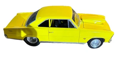 American Muscle ERTL  1966 Pro Stock Nova SS 327 Yellow 1:18 Diecast - Image 1 of 3
