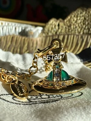 Vivienne Westwood  small orbit 3D necklace Gold Blue Crystal - Image 1 of 4