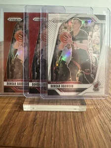 2024-25 Panini Prizm DUNCAN ROBINSON Bianco + Onda Rubino + Pallacanestro Prizm 3 Card - Foto 1 di 3