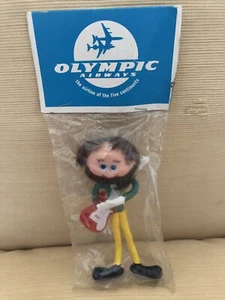 Bambola vintage rara da collezione Olympic Airways anni 70 gomma pieghevole chitarrista - Foto 1 di 2