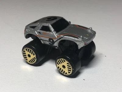 1.3" 1983 Porsche 928 Monster Wh. Galoob Micro Machines 1/100 Plastic Mint Loose - Image 1 of 4