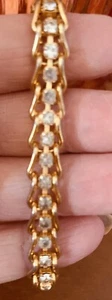 Bracelet with gold metal and clear rhinestones. 7”. Clasp - Picture 1 of 10