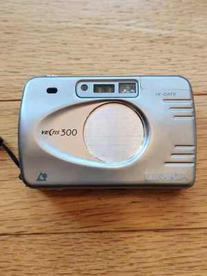 Cámara fotográfica Minolta Vectis 300 IX fecha AF 24-70 mm apuntar y disparar APS no probada  Foto 1 de 4
