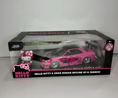 Jada Toys 1/24 2002 Nissan Skyline GT-R (BNR34) with Hello Kitty Figure - Image 1 of 4