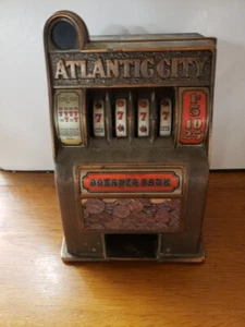 Vintage Atlantic City Bonanza Bank Toy Slot Machine Cast Metal Front Missing Arm - Picture 1 of 6