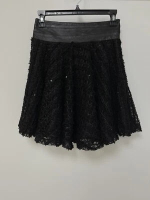 Falda para mujer MILLY acampanada corta de cuero cintura con cuentas negra talla 0 Foto 1 de 4