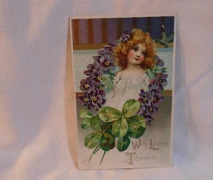 With Loving Thoughts Girl & Violets Wreath & 4 Leaf Clovers Antique Postcard . - Picture 1 of 2