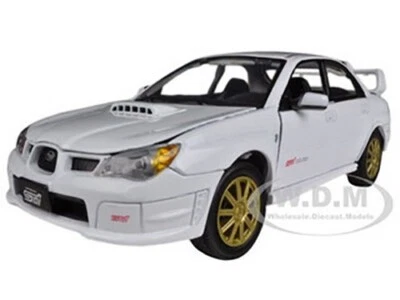 SUBARU IMPREZA WRX STI WHITE 1/24 DIECAST MODEL CAR BY MOTORMAX 73330 - Image 1 of 4