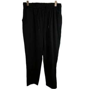 Lululemon Women’s Size 10 Stretch High Rise 7/8 Pants Pull On Black Tie Front - Picture 1 of 12
