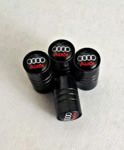 4 Stück Ventilkappen im Audi Stil Aluminium Schwarz mit roter Schrift Rund - Bild 1 von 3