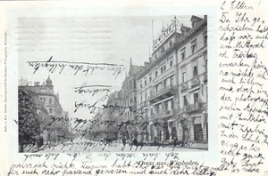 AK Wiesbaden Strasse mit dem Geschäft Wirth, um 1910 nach Schornsheim - Bild 1 von 2