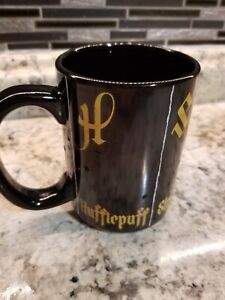 Harry Potter Hogwarts Houses - Heat Activated Color Changing Mug Zak! Griffindor