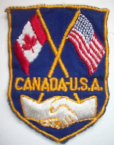 Canada USA flags shaking hands friends TRAVEL EMBROIDERED SOUVENIR PATCH - Picture 1 of 2